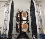 Falcon 9 fairing with Iridium-1 satellites (SpaceX)