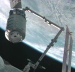 Cygnus grappled by ISS arm on COTS mission (NASA)